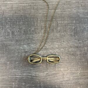 Brass necklace with sunglasses charm